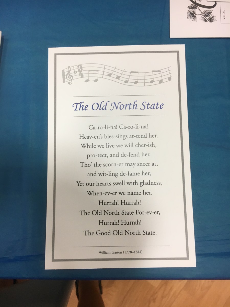Card with some of the lyrics to the North Carolina State song, The Old North State