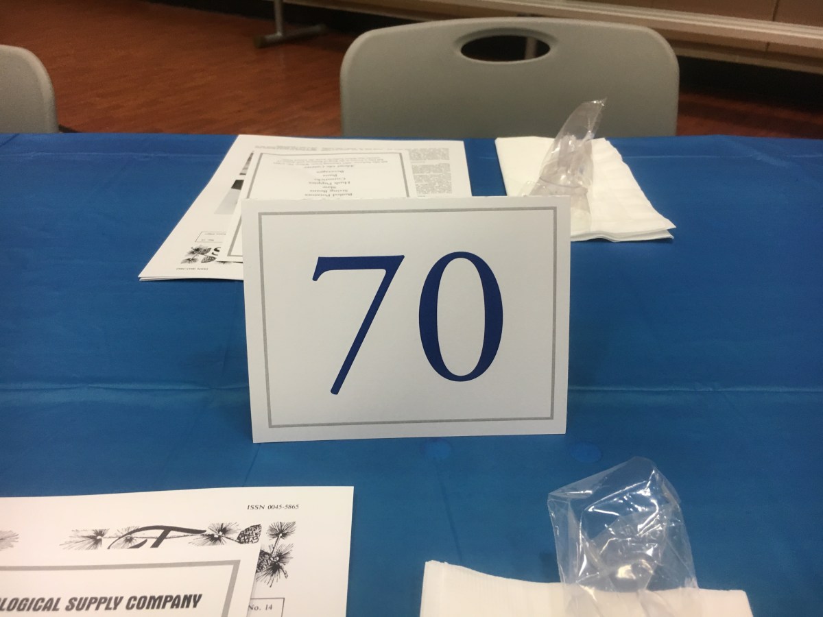 Tent card on a table with a number on it