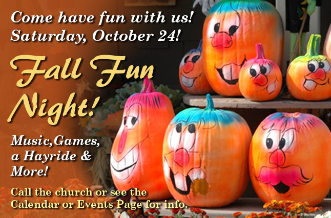 Funny faces on painted pumpkins